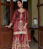 maroon silk blend zari sequined and embroidery work with floral motifs and detailed contrast border. semi stitched suit