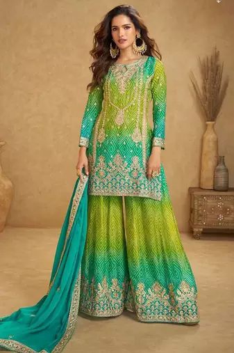 turquoise blue silk blend embroidery and handwork semi stitched suit