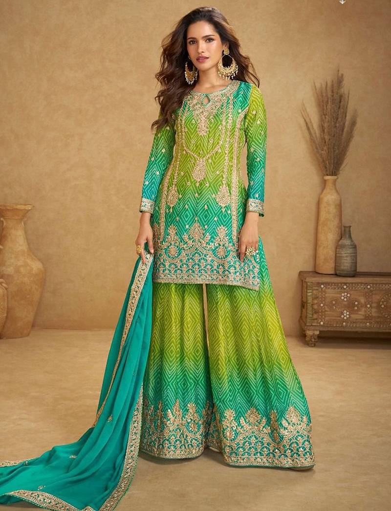 turquoise blue silk blend embroidery and handwork semi stitched suit