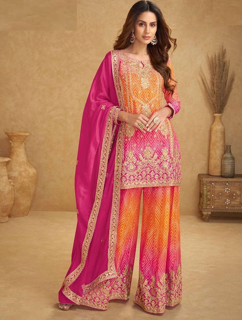 pink silk blend embroidery and handwork semi stitched suit