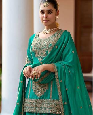  emerald green silk blend zari embroidery thread work motif work sequined and detailed border semi stitched suit 2