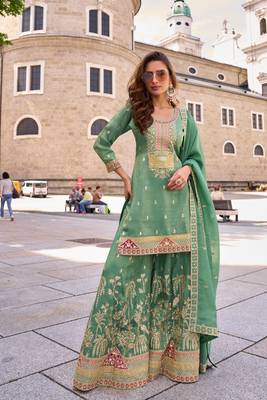 sea green silk blend embroidered  sequined  stone & beads semi stitched suit 1