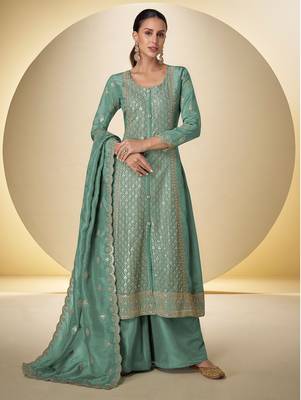 sea green silk blend embroidered & sequined semi stitched suit 1