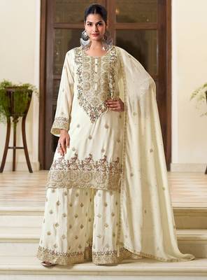 off white silk blend embroidered  hand work & sequined semi stitched suit 1