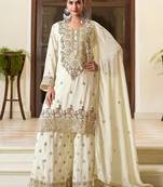 off white silk blend embroidered  hand work & sequined semi stitched suit