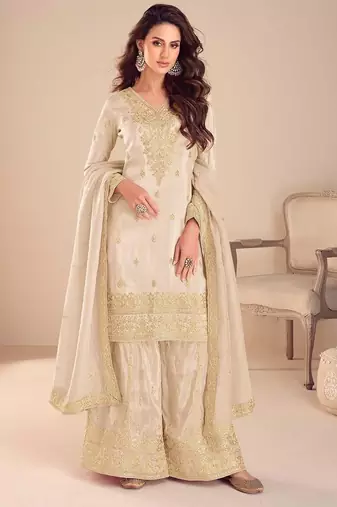 beige silk blend embroidered and sequined semi stitched suit