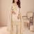 beige silk blend embroidered and sequined semi stitched suit
