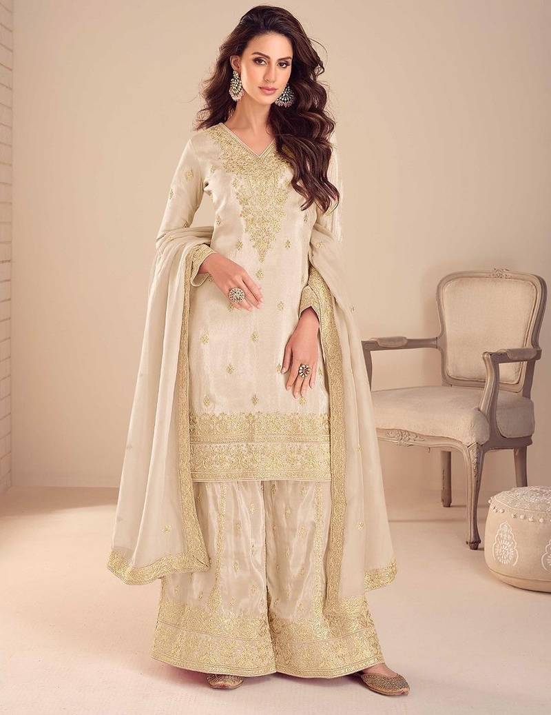 beige silk blend embroidered and sequined semi stitched suit
