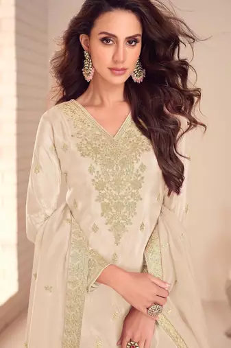 beige silk blend embroidered and sequined semi stitched suit