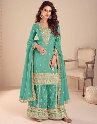 turquoise silk blend embroidered and sequined semi stitched suit 1