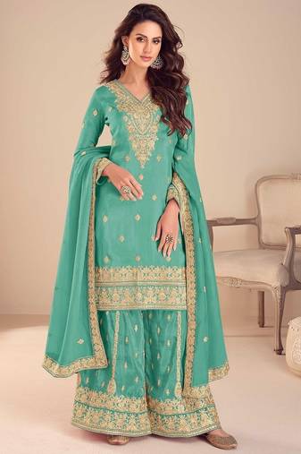 turquoise silk blend embroidered and sequined semi stitched suit