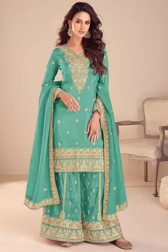 turquoise silk blend embroidered and sequined semi stitched suit