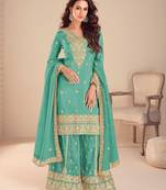 turquoise silk blend embroidered and sequined semi stitched suit