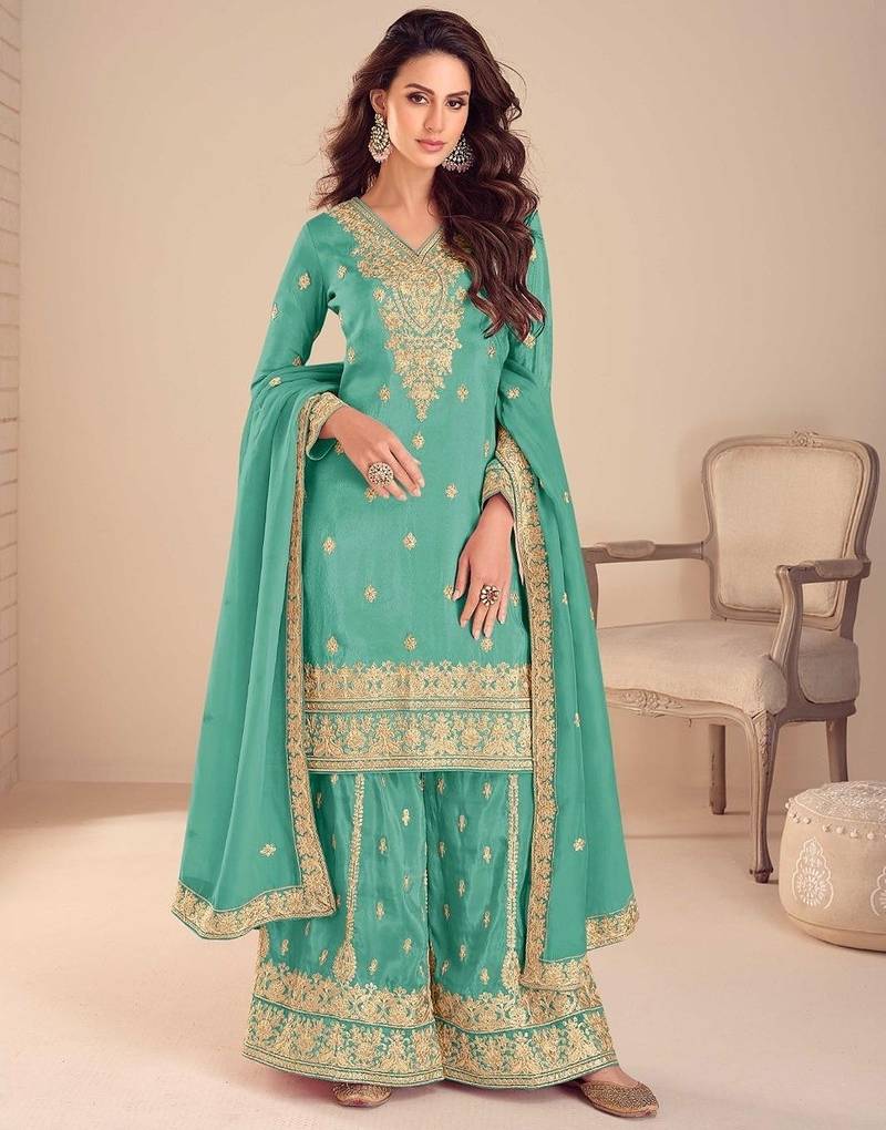turquoise silk blend embroidered and sequined semi stitched suit