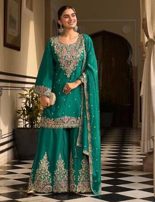 teal green silk blend embroidered  sequined & mirror semi stitched suit 1