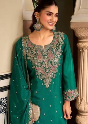 teal green silk blend embroidered  sequined & mirror semi stitched suit 2