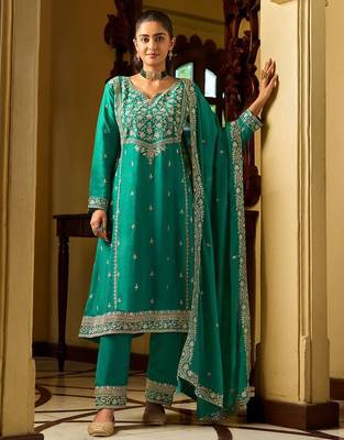 rama green silk blend gold silver zari embroidered  sequined & mirror semi stitched suit 1