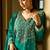 rama green silk blend gold silver zari embroidered  sequined & mirror semi stitched suit