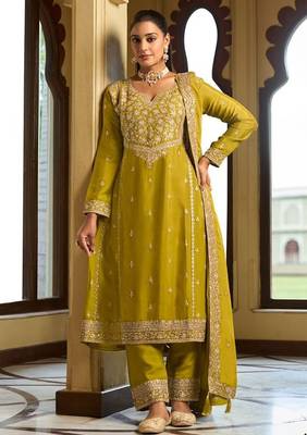 mustard silk blend gold silver zari embroidered  sequined & mirror semi stitched suit 1
