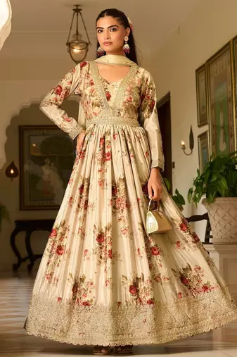 cream georgette zari embroidered  sequined and printed semi stitched suit
