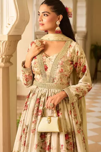 cream georgette zari embroidered  sequined and printed semi stitched suit