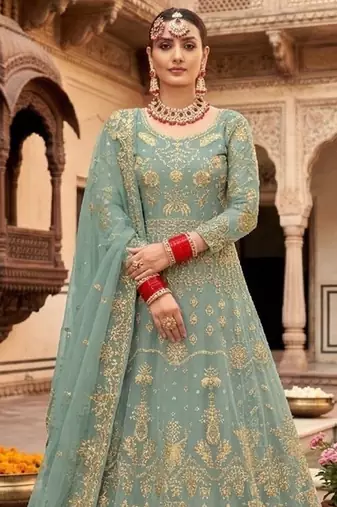 teal net embroidery work  sequined cording & stone work. semi stitched suit