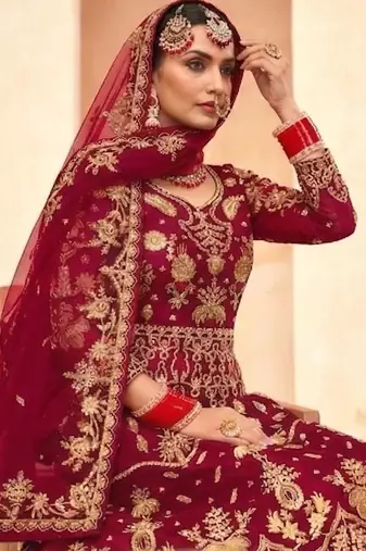 red net embroidery work  sequined cording & stone work. semi stitched suit