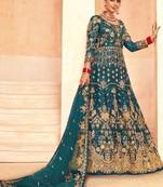 emerald green net embroidery work  sequined cording & stone work. semi stitched suit