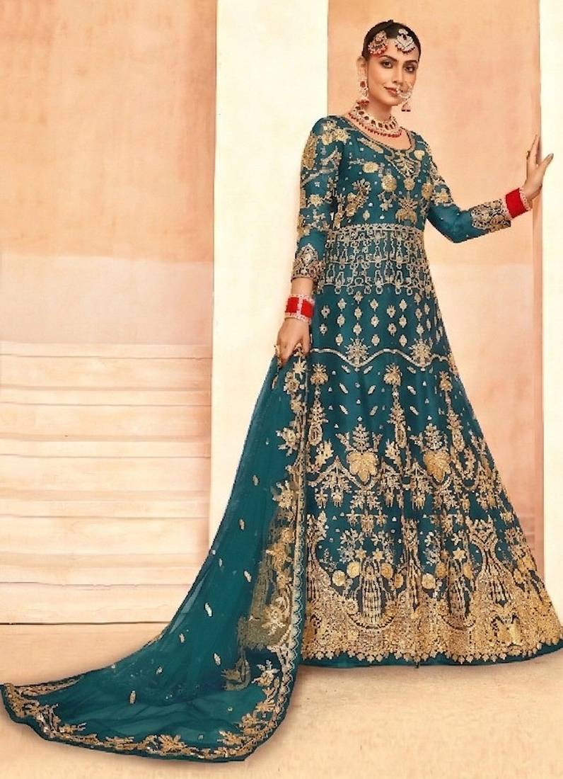 emerald green net embroidery work  sequined cording & stone work. semi stitched suit