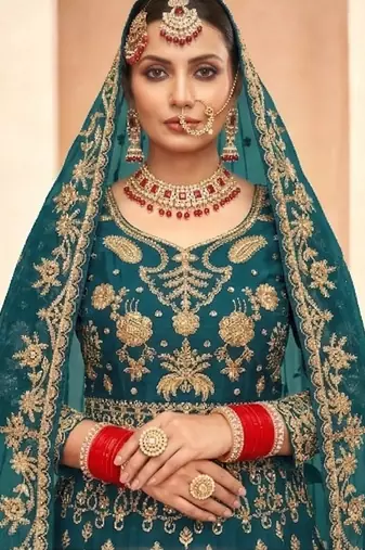 emerald green net embroidery work  sequined cording & stone work. semi stitched suit