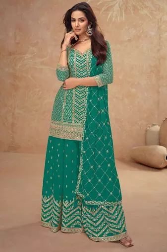 teal chiffon gold and self colored diamond lattice embroidery semi stitched suit
