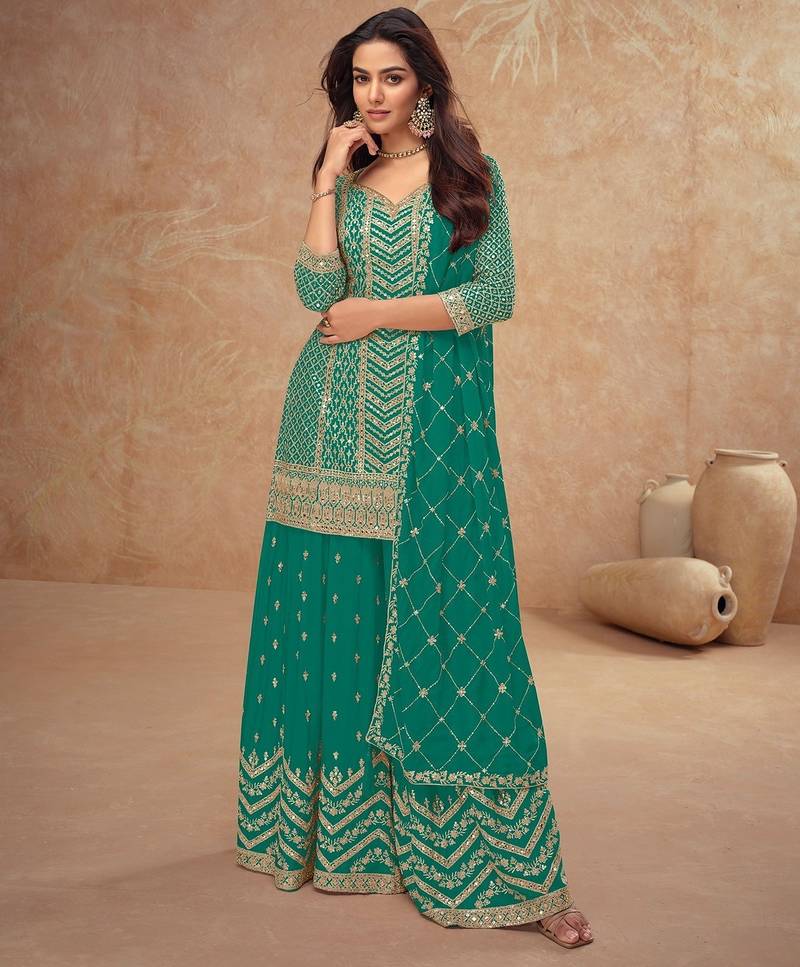 teal chiffon gold and self colored diamond lattice embroidery semi stitched suit