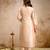 cream fancy fabric heavy thread embroidery work semi stitched suit