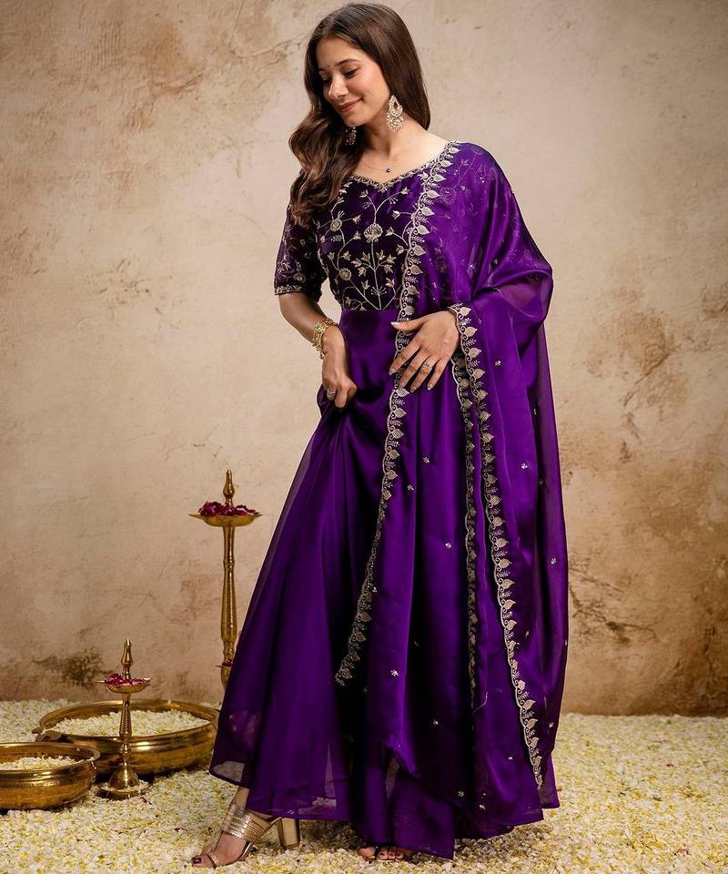 purple fancy fabric heavy thread embroidery work semi stitched suit
