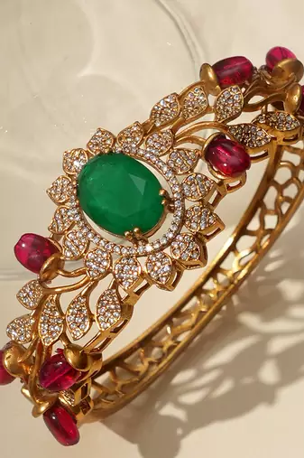 Gold plated green stone kundan bracelet