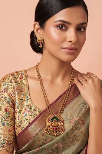 Gold plated green stones laxmi haar necklace set