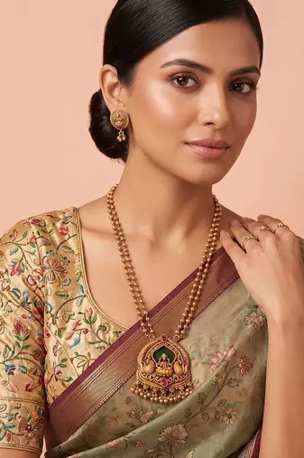 Gold plated green stones laxmi haar necklace set