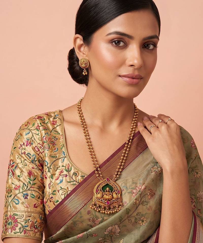Gold plated green stones laxmi haar necklace set