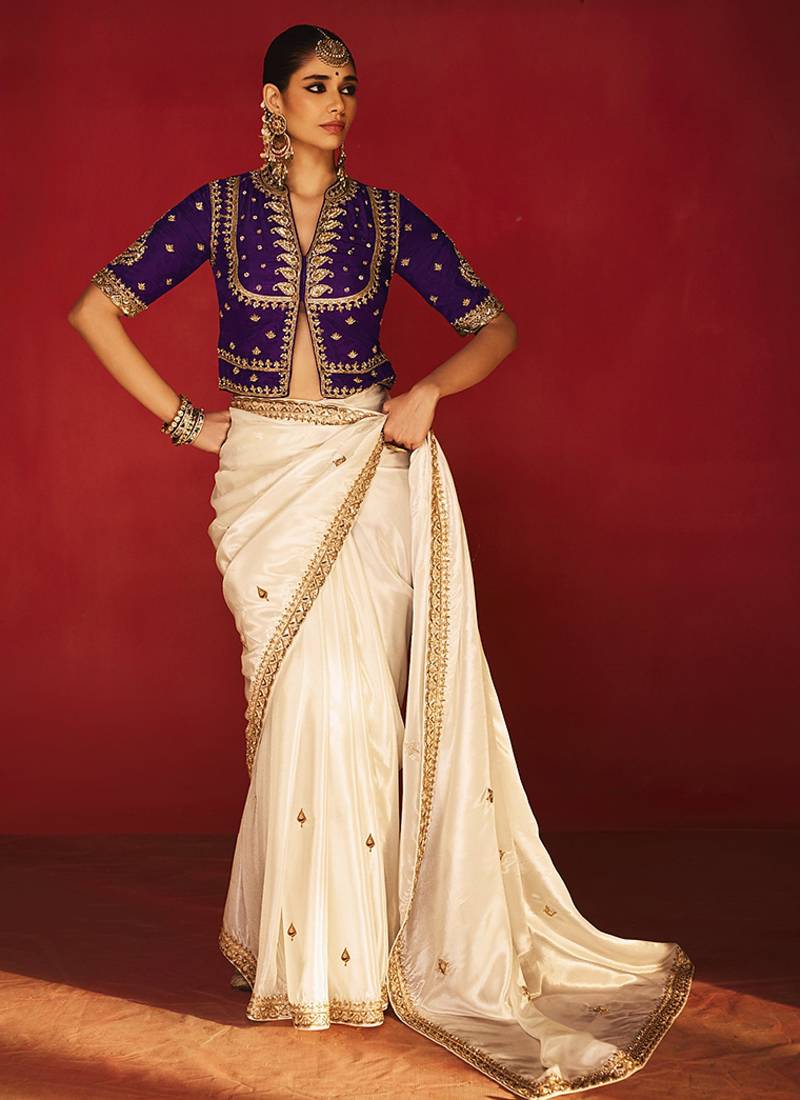 White fancy soft shimmering sequin stone work party wear saree