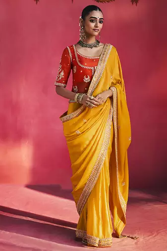 Orange fancy soft shimmering sequin stone work party wear saree