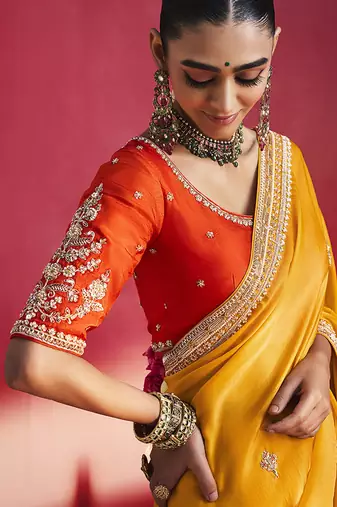 Orange fancy soft shimmering sequin stone work party wear saree