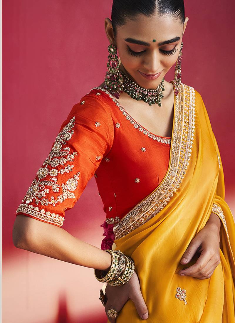 Orange fancy soft shimmering sequin stone work party wear saree