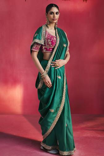 Green fancy soft shimmering sequin stone work party wear saree