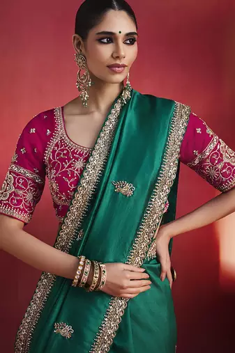 Green fancy soft shimmering sequin stone work party wear saree