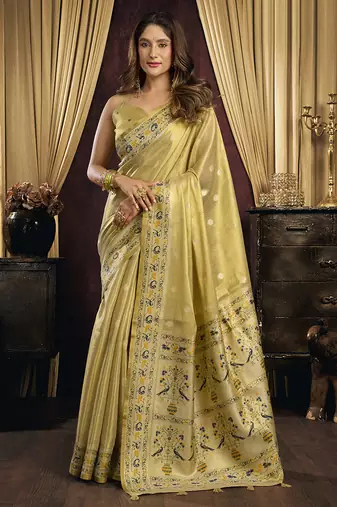cream tissue with tassels traditional wear saree