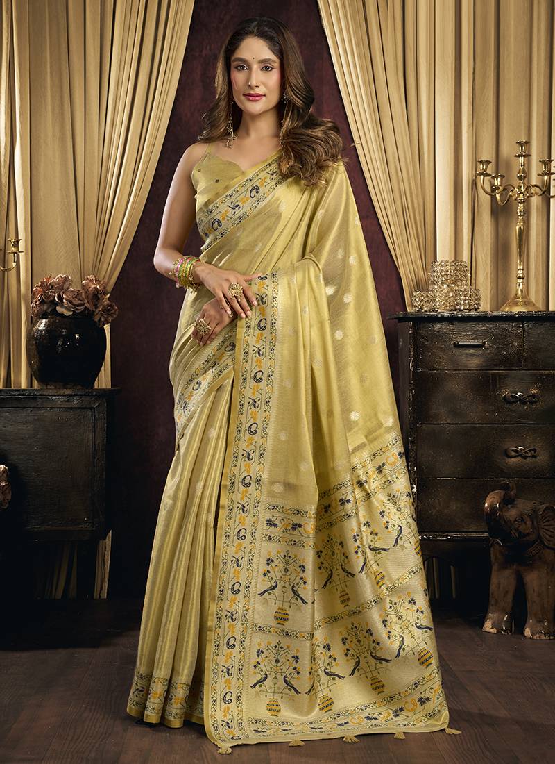 cream tissue with tassels traditional wear saree