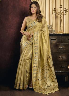 cream tissue with tassels traditional wear saree 2