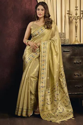 cream tissue with tassels traditional wear saree