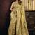 cream tissue with tassels traditional wear saree