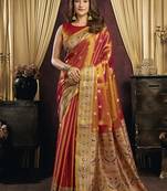 orange tissue with tassels traditional wear saree